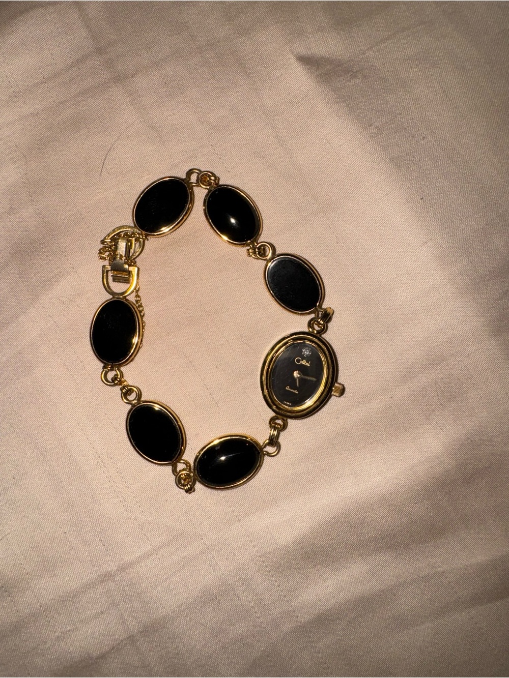 Gold-Tone Black Oval Link Bracelet Watch